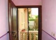 Moustiquaire à enroulement latéral